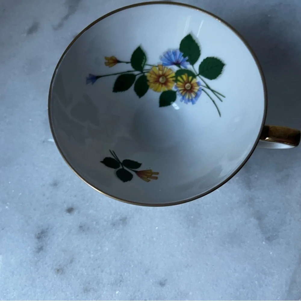 Elegant White floral Teacup with Gold Trim